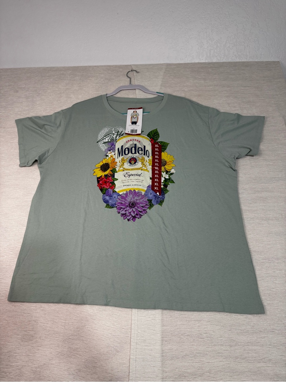 ModelCo Sage Green Tee with Colorful Floral Modelo Graphic
